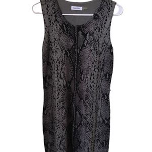 Calvin Klein sheath dress. Super comfortable fabric. 100% acrylic. Size M